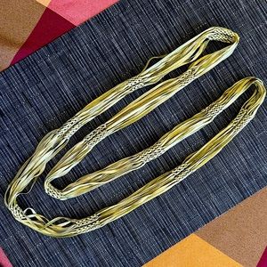 Handcrafted necklace in olive green.